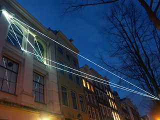 Carlo Bernardini, The Light that Generates Space 2010, installazione ambientale in fibre ottiche, mt h da terra 15x15x10; NIMk - Netherlands Media Art Institute, Sonic Acts, The poetics of space, Amsterdam.